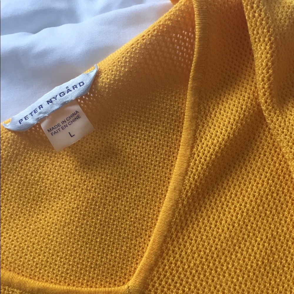 Yellow knit three quarter sleeved sweater.